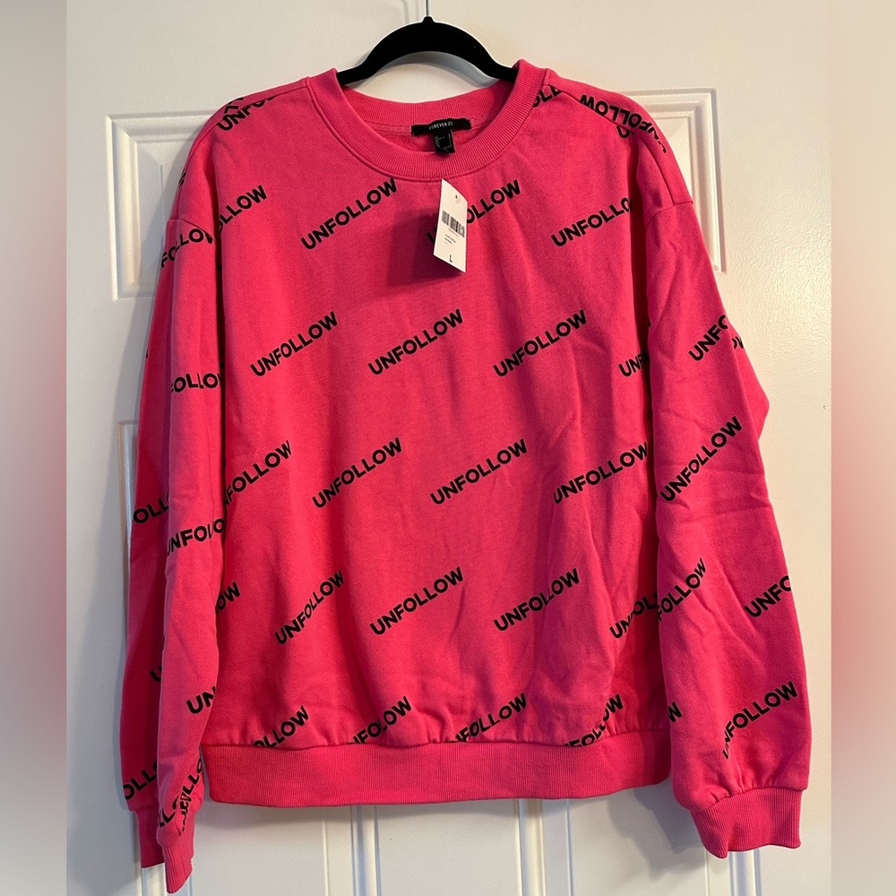 New with tags Forever 21 Pink “Unfollow” Sweatshirt Large